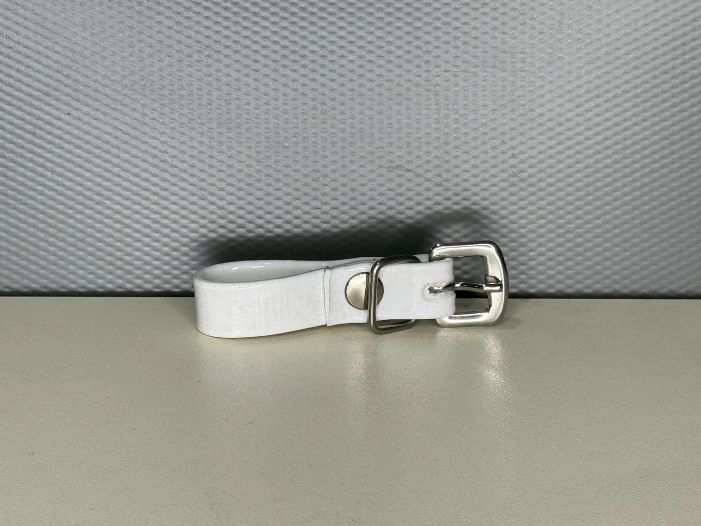 BIT LIFTER BUCKLE ATTACH PVC (WHT)